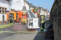 Feuer 3 Dachstuhlbrand Koeln Rath Heumar Gut Maarhausen Eilerstr P541
